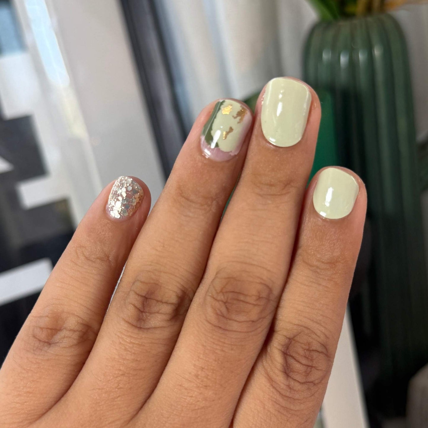 close up of sage martini nail wraps