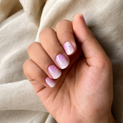 Hands wearing Cherry Blossom Nail Wraps by Namora 