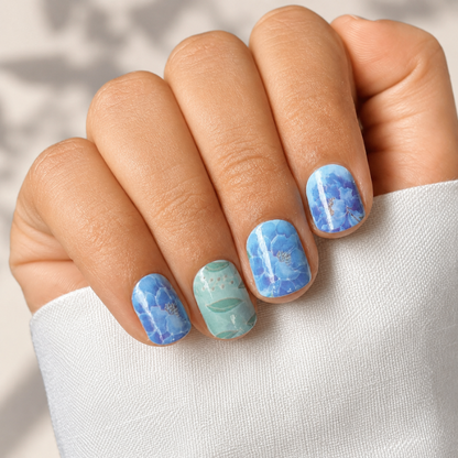 Hands wearing Dream Of Blue Nail Wraps by Namora 