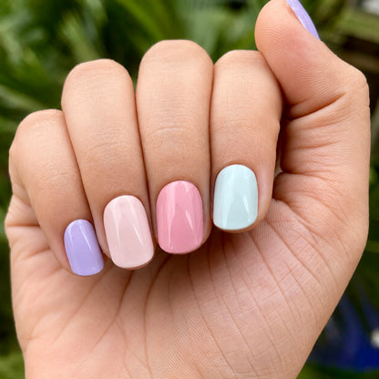 Hand wearing harmony nail wraps by namora