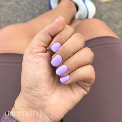 Hand wearing Lilac Nail Wraps by Namora