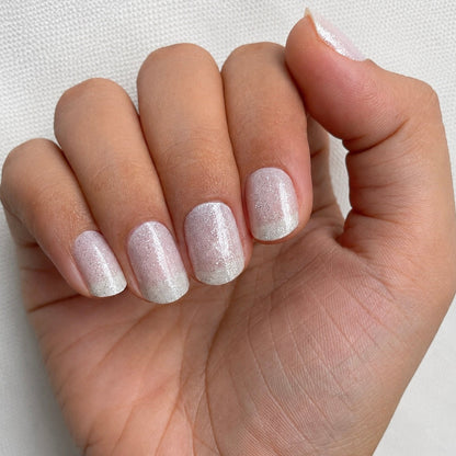Hand wearing Milky Way nail Wraps by Namora
