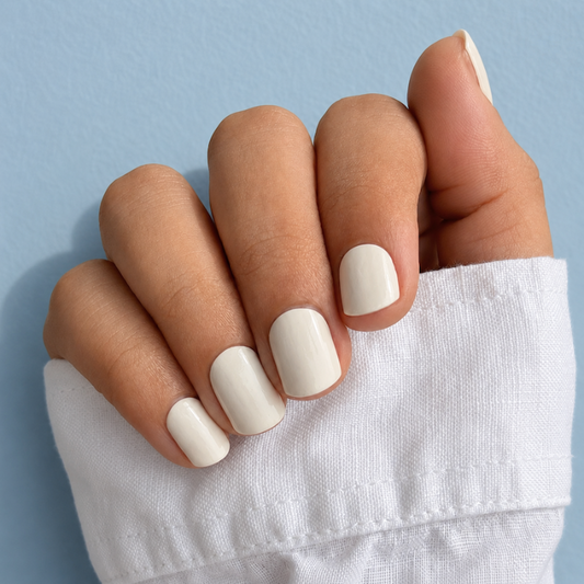 Hand Wearing Oat Milk Nail Wraps by Namora 