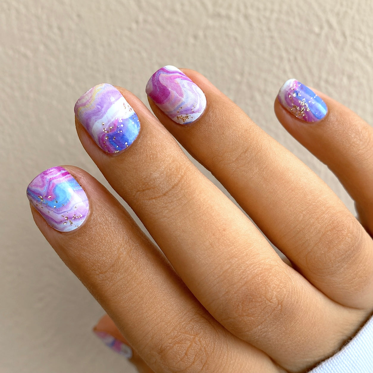 Nails wearing Pink Galaxy Nail wraps by Namora 
