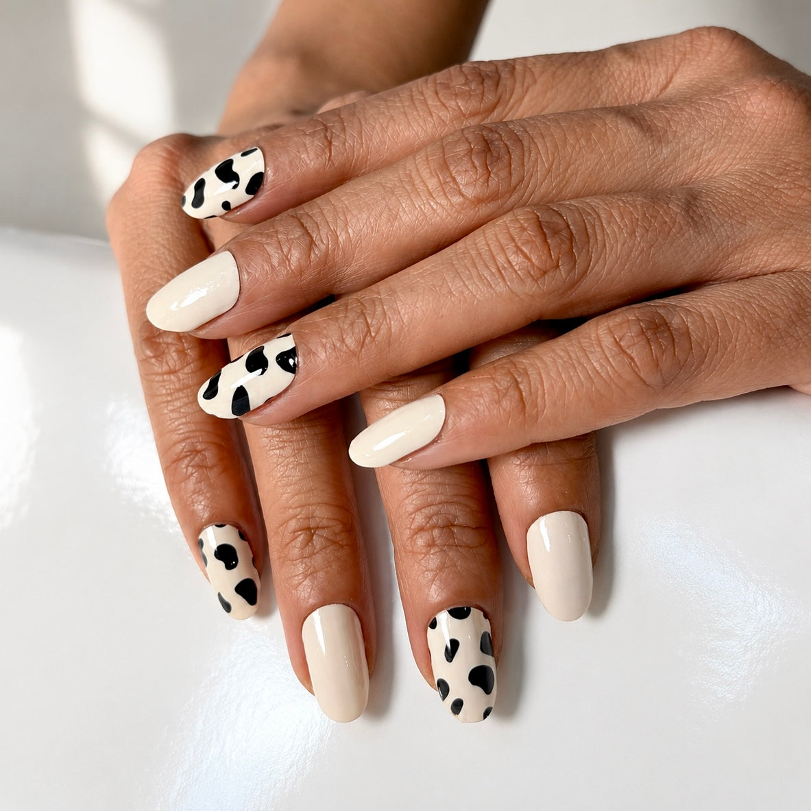 Hands wearing Savannah Nail Wraps by Namora 