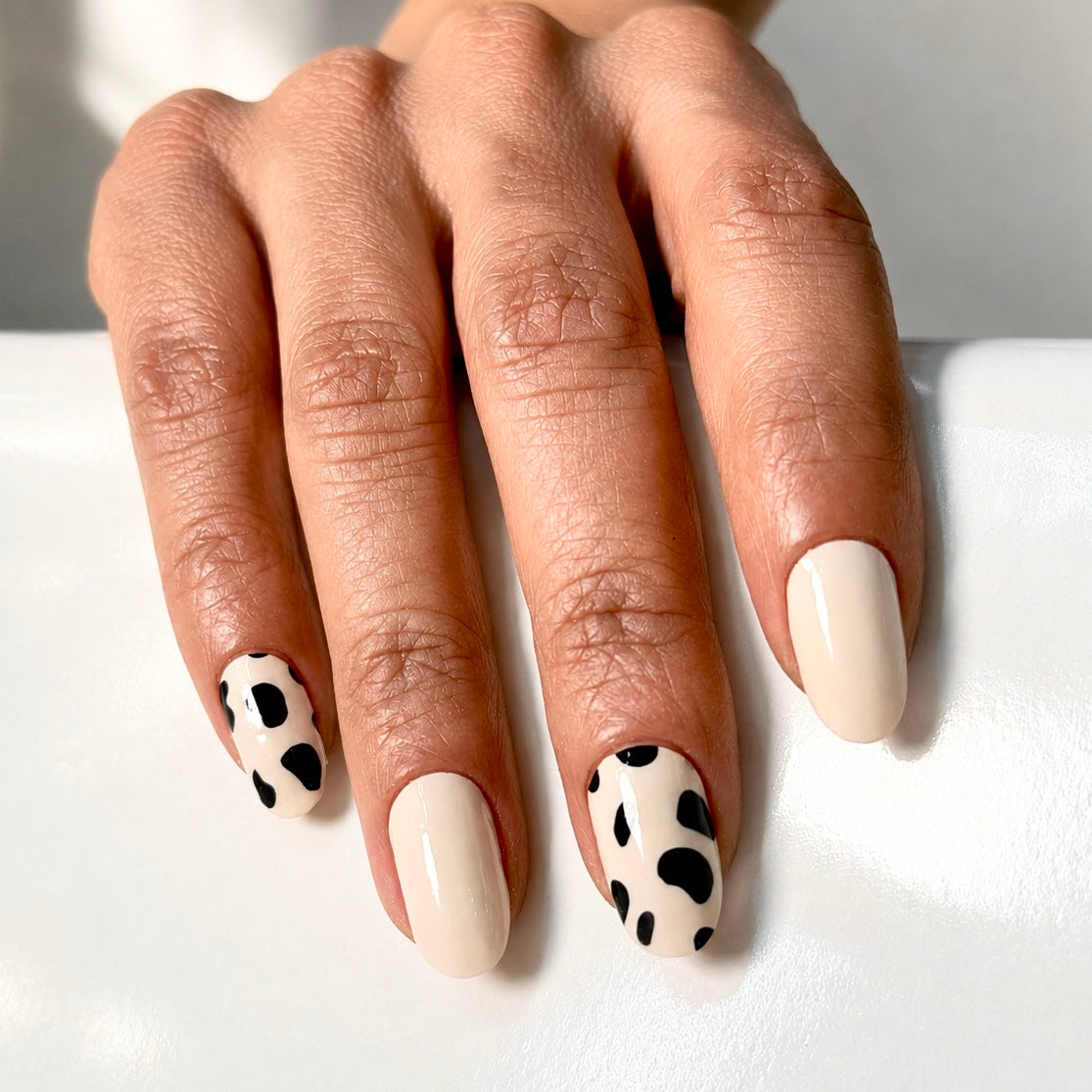 Hands wearing Savannah Nail Wraps by Namora 