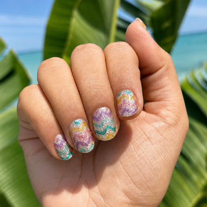 Hand wearing Shimmy Jimmy nail wraps by Namora