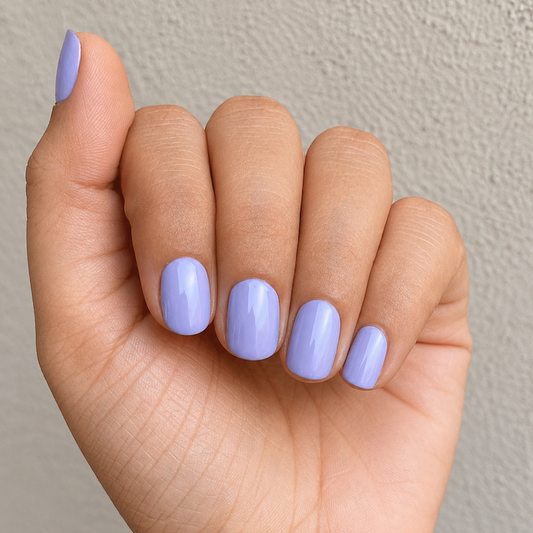Hand wearing Soft Lavender Nail Wraps by Namora 