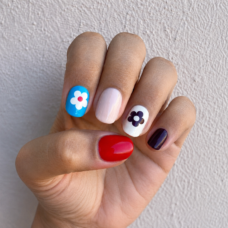 Hand wearing Vintage Pop Nail Wraps by Namora 
