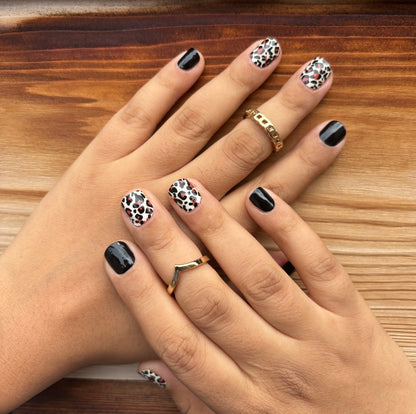 Hands wearing Wild cat nail Wraps by Namora