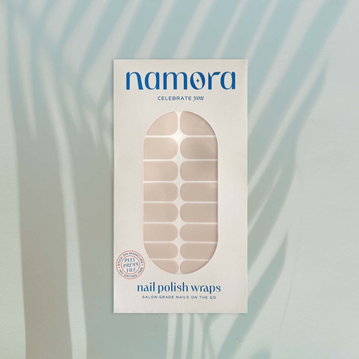 Namora nail polish wraps packaging on a light blue background